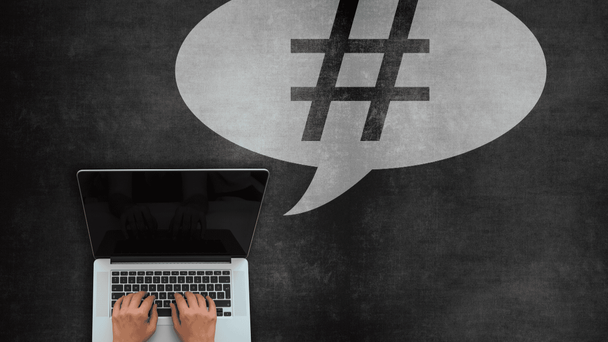 Promoting a Tweet | How to Promote a Tweet | When to Promote a Tweet | Hashtag Emanating from Laptop